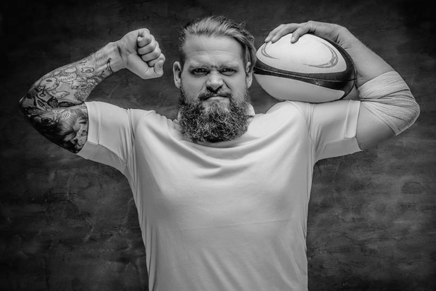 Rugbyman portant le ballon, symbole du collectif et de la méthode Scrum chez Intuitiv